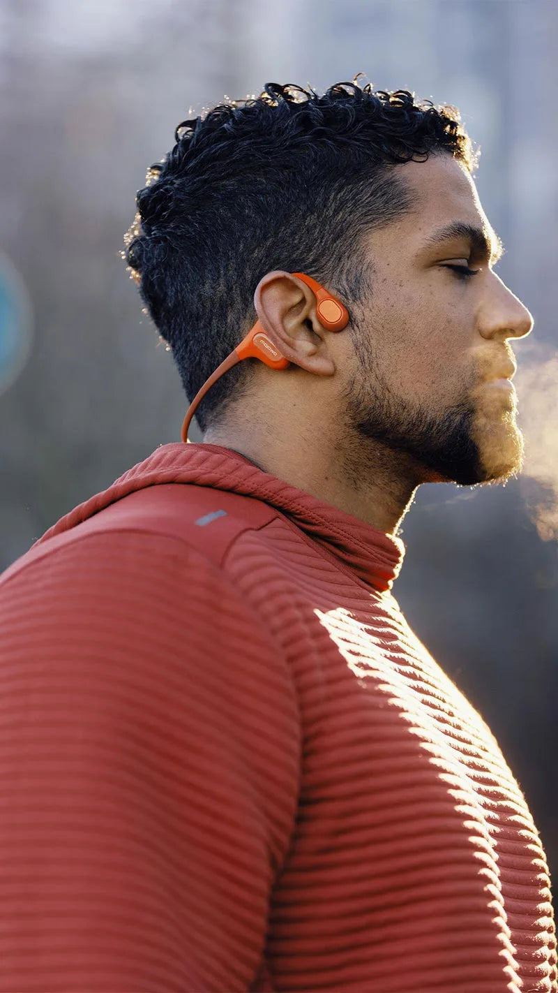 Black-man-wears-run-plus-open-ear-headphone-moible