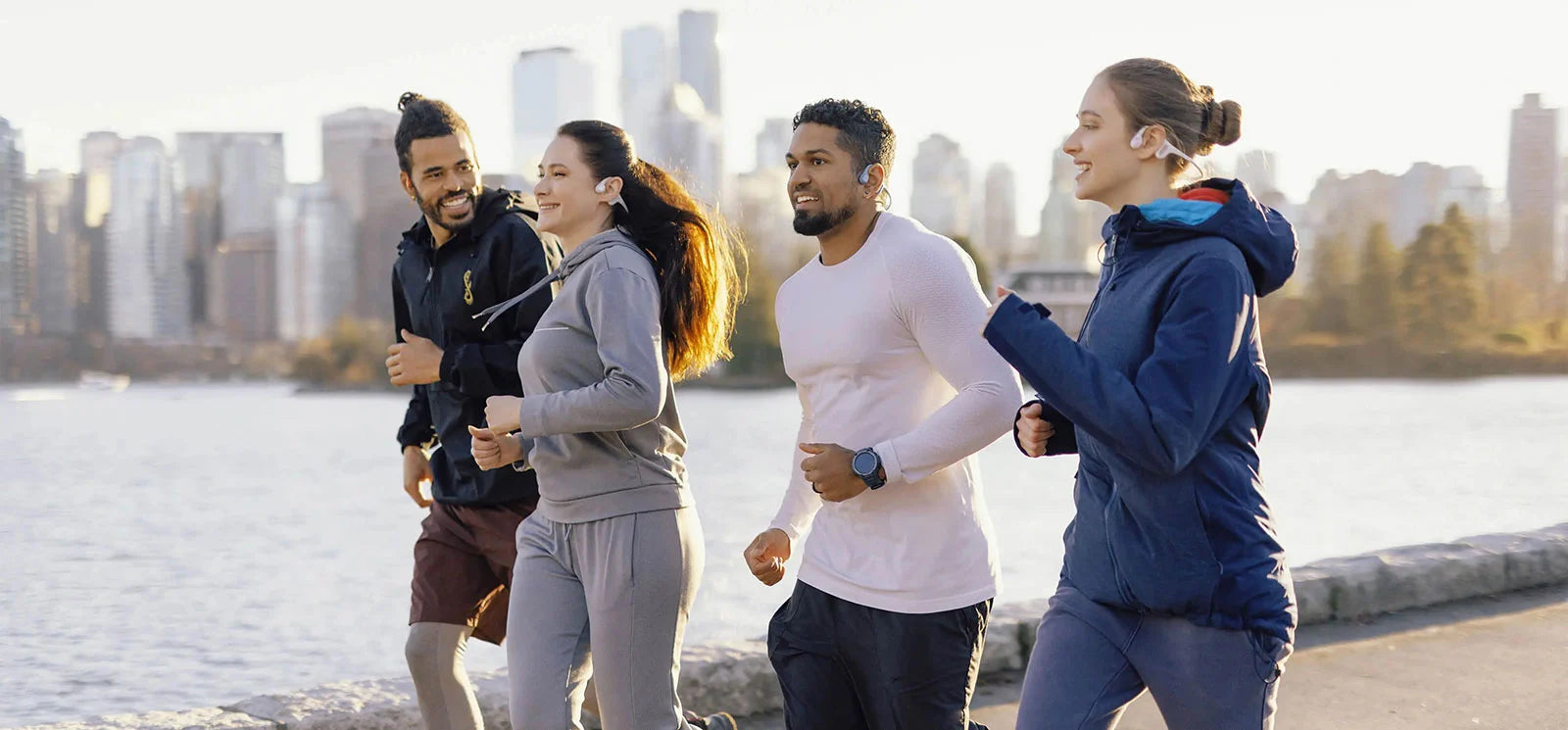 team-jogging-with-run-plus-open-ear-headphone